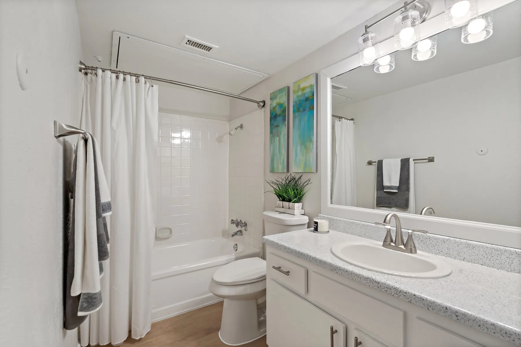 Bathroom with vanity and tub-shower at Regal Court