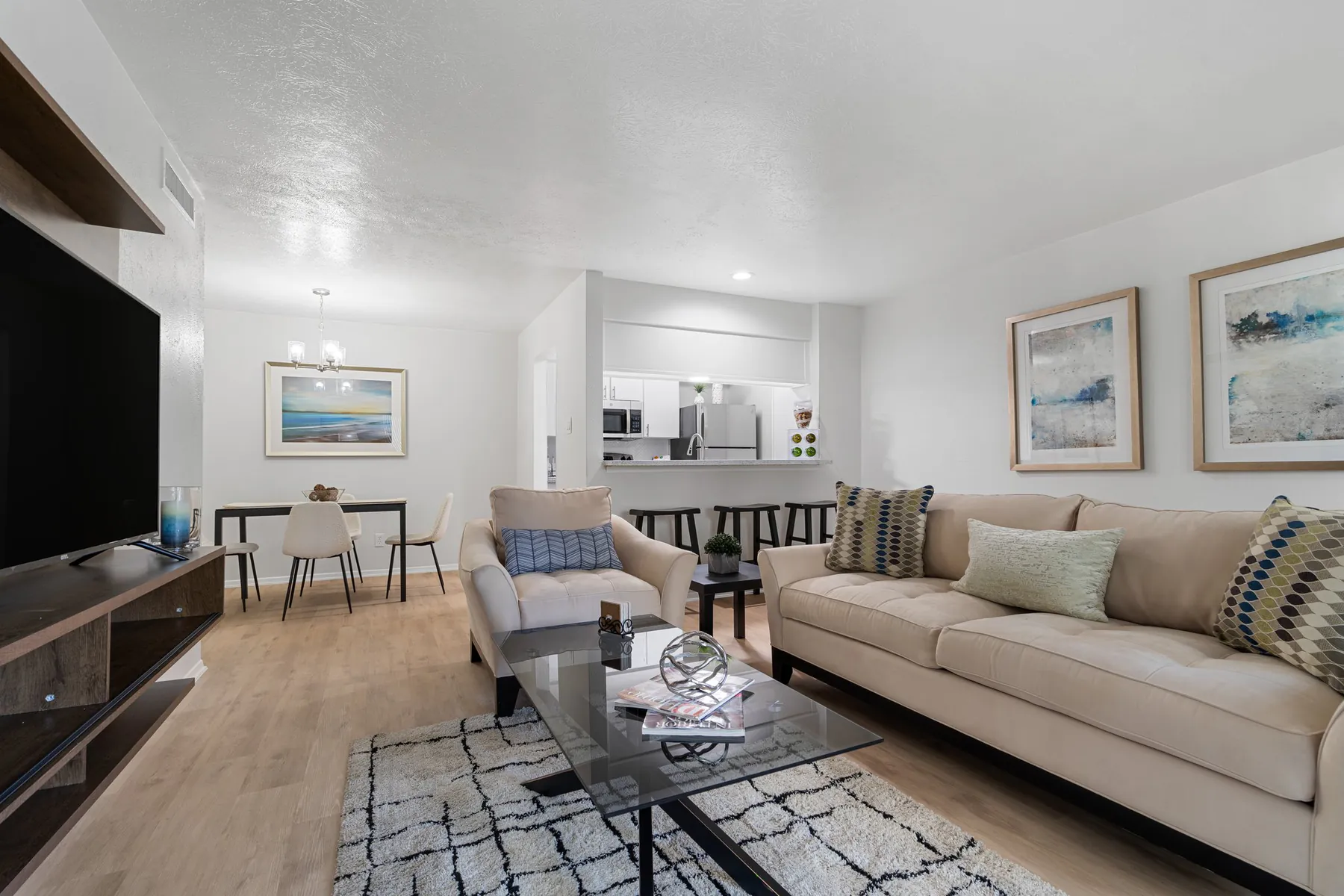 Open living and dining area in a Regal Court apartment home